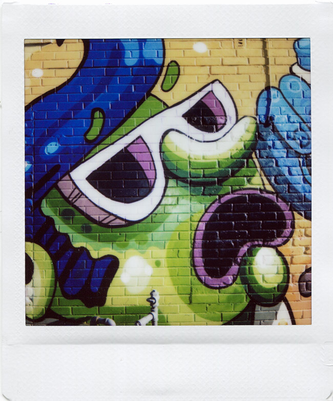 Denver mural photographed with an Instax SQ6 camera